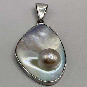 Mabe Blistered Pearl Large Pendant Signed Charles Albert Sterling Silver Bezel